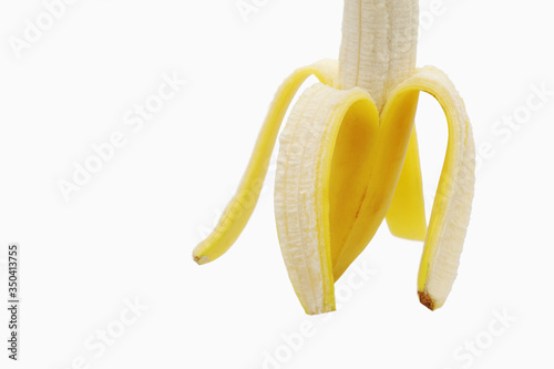 A partially peeled banana