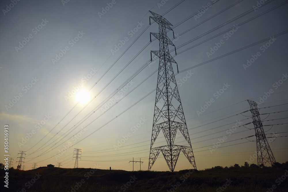 Shot of electricity pylons at sunrise