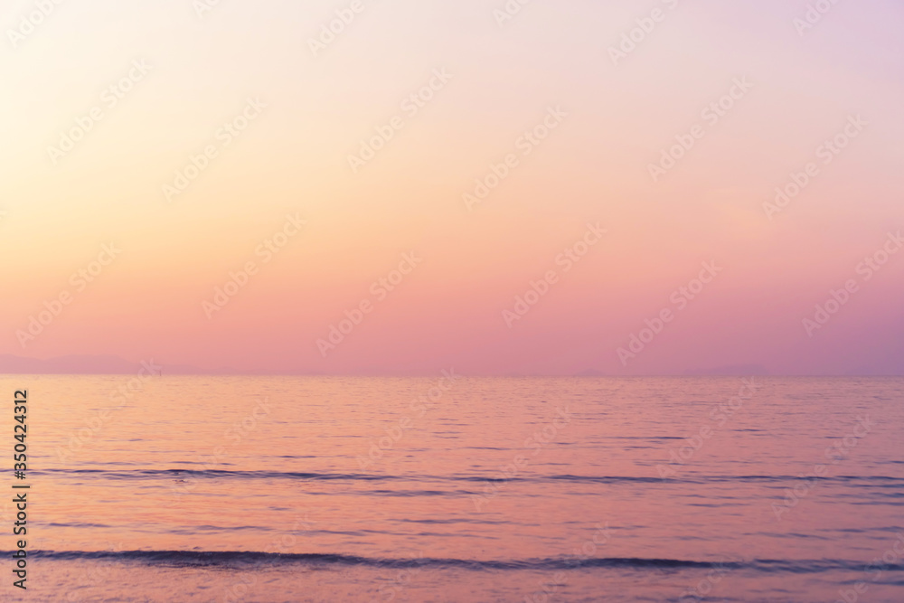Tropical nature clean beach and white sand in summer with sun light blue sky and bokeh background. Tropical nature clean beach and white sand in summer with sun light blue sky and bokeh background.