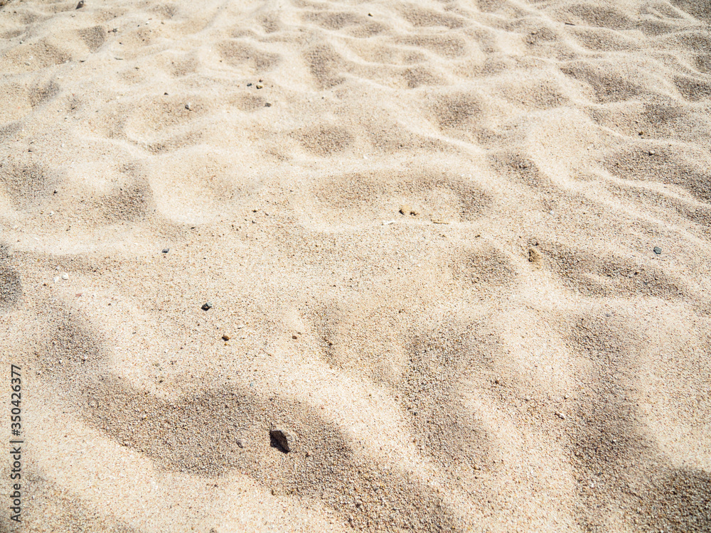 Texture of yellow sand, close up view. Abstract background. Egyptian beach in february, Red Sea. Selective soft focus. Blurred background Texture of yellow sand, close up view. Abstract background. Egyptian beach in february, Red Sea. Selective soft focus. Blurred background