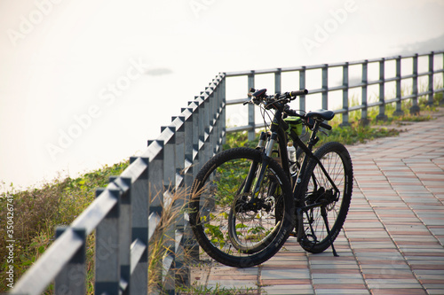 Classic mountain bicycle stop on street of park outdoor at riverside Mekhong river on October 2, 2019 in Mukdahan, Thailand