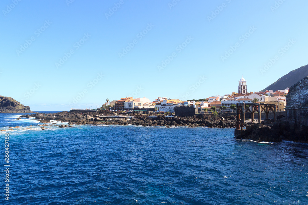 Coastline and town Garachico panorama with Atlantic Ocean on Canary Island Tenerife, Spain
