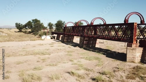 4K aerial drone video view of historical railway bridge on main B6 road from Windhoek to Gobabis near settlement Seeis in central highland Khomas Hochland of Namibia, southern Africa photo