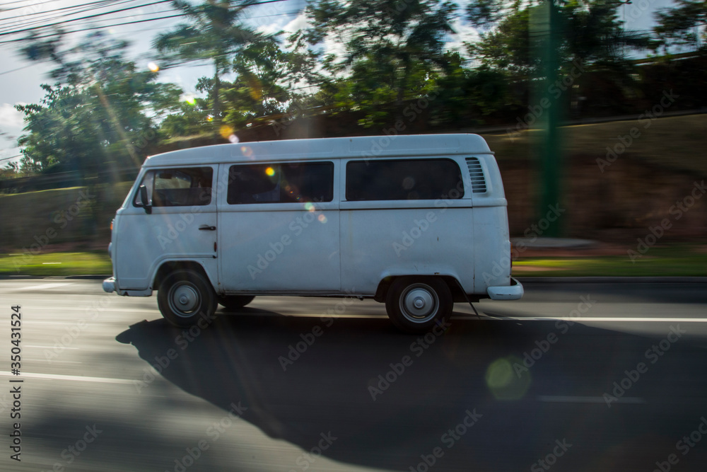 white vintage van on the road