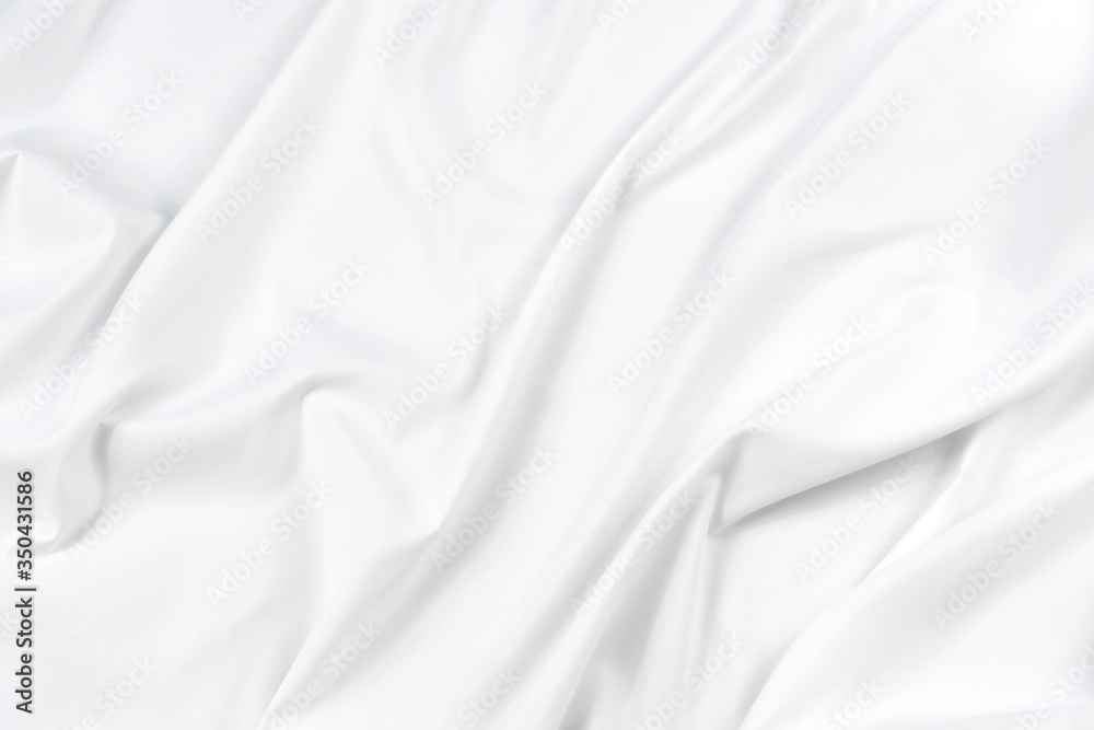Abstract white fabric texture background. Cloth soft wave. Creases of satin, silk, and cotton. Abstract white fabric texture background. Cloth soft wave. Creases of satin, silk, and cotton.