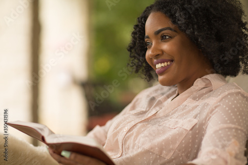 African American woman studing and reading the Bible. photo