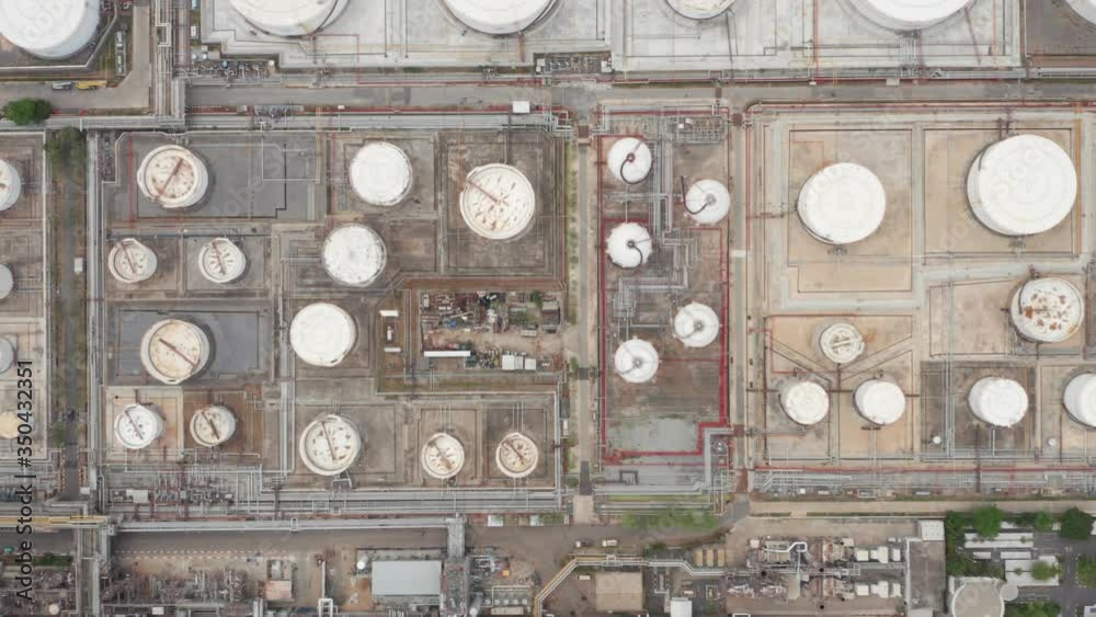 Aerial view of oil refinery and oil storage tanks. Shot from drone of oil refinery and petrochemical plant by Chaopraya river, Bangkok, Thailand
Aerial view of oil refinery and oil storage tanks. Shot from drone of oil refinery and petrochemical plant by Chaopraya river, Bangkok, Thailand