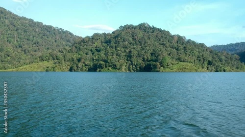 A dolly shot of a lake. photo