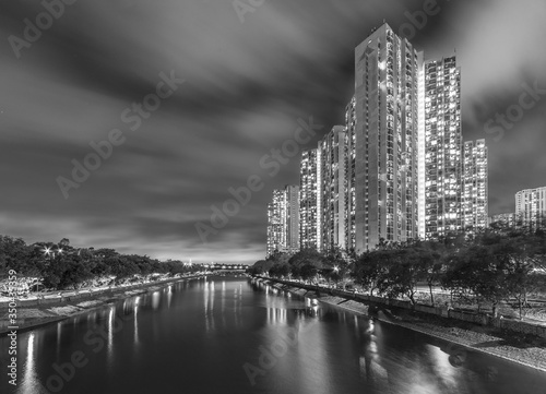 High rise residential building in Hong Kong city at night © leeyiutung