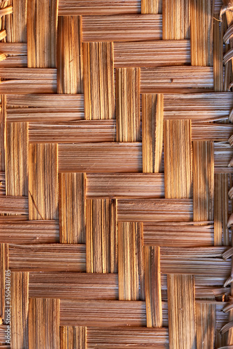 The patterns are rectangular with brown wood texture. Natural surface of the working space. cracked and friable. macro photo. vertical shot.