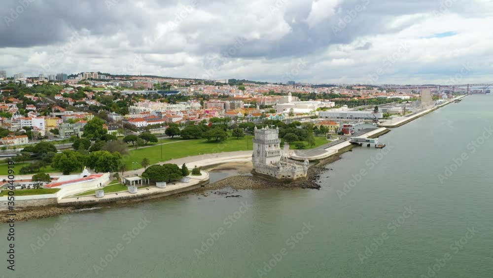Empty Belem tower, during COVID-19, partly sunny day, in Lisbon, Portugal - Aerial, orbit, drone view Empty Belem tower, during COVID-19, partly sunny day, in Lisbon, Portugal - Aerial, orbit, drone view