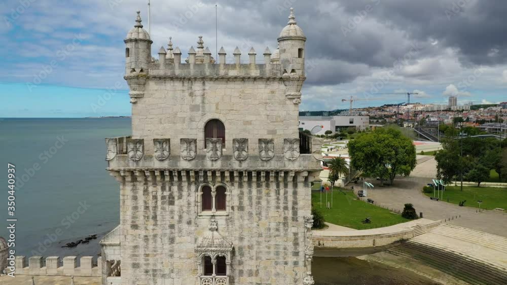 Aerial, drone view panning around the empty Belem tower, during COVID-19, partly sunny day, in Lisbon, Portugal Aerial, drone view panning around the empty Belem tower, during COVID-19, partly sunny day, in Lisbon, Portugal
