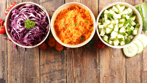 assorted of vegetable salad, cabbage, cucumber and grated carrot