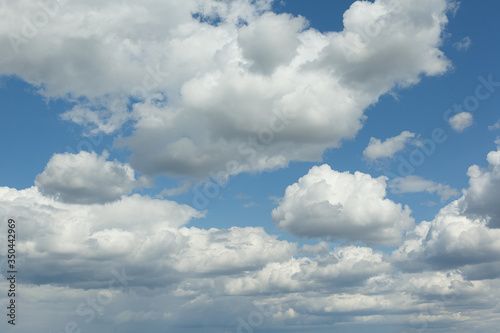 Fototapeta Naklejka Na Ścianę i Meble -  Blue sky background with a tiny clouds