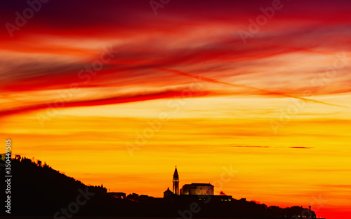 the church on the hill at the beginning of the night © florinfaur