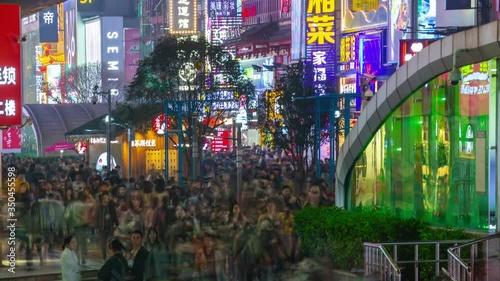 changsha city downtown night time illuminated crowded pedestrian street rooftop panorama timelapse 4k china photo