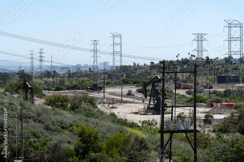 Oil field with high voltage transmission lines photo