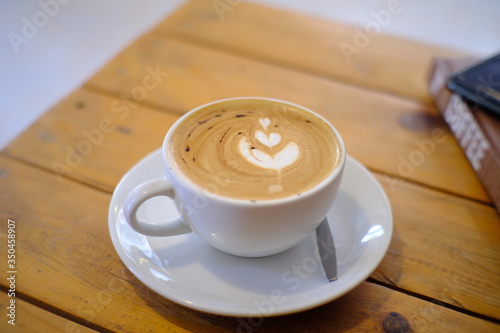 hot latte coffee put on table