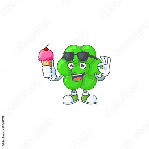 Happy face of staphylococcus aureus cartoon mascot having an ice cream