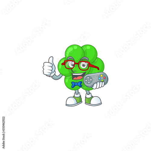 Cartoon mascot design of staphylococcus aureus play a game with controller