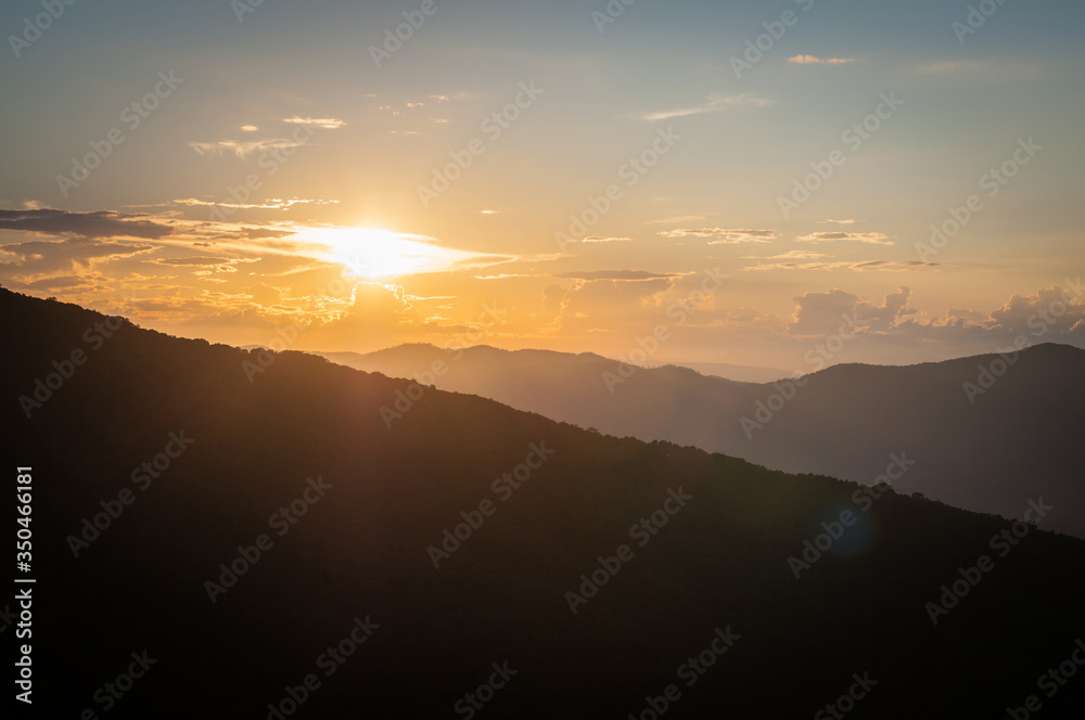 Obraz premium Sunset and Mountain view landscape.