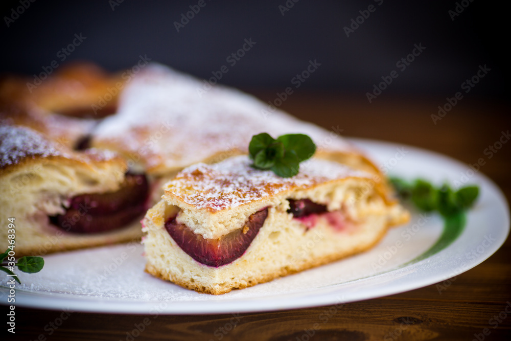 sweet baked homemade plum cake with icing sugar sweet baked homemade plum cake with icing sugar