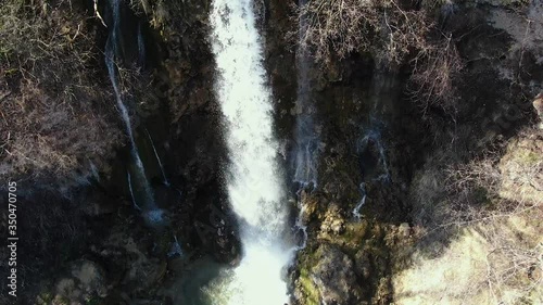 Gostilje Waterfall, Zlatibor Mountain, Serbia, Aerial View, Close Up, Tilt Up 60fps photo