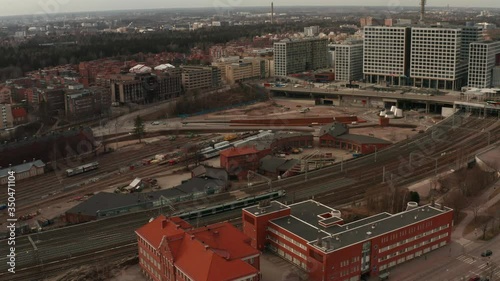 Train leaving Pasila station in Helsinki aerial photo