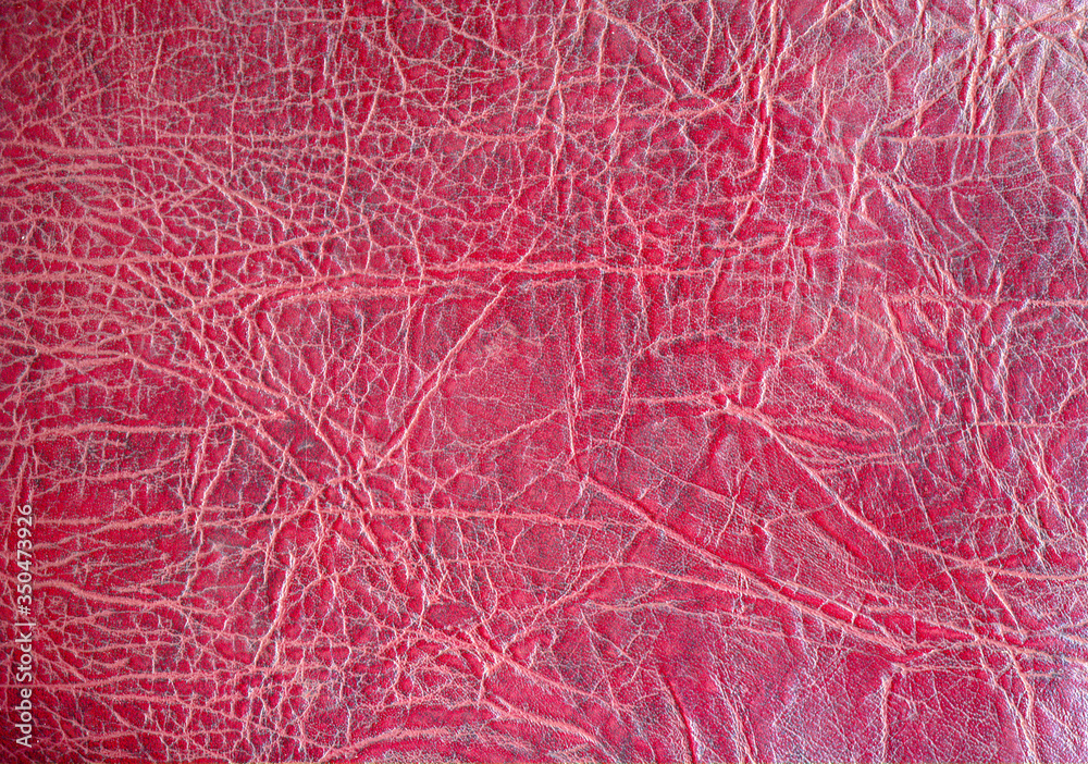 Fototapeta premium the surface of red leather as background