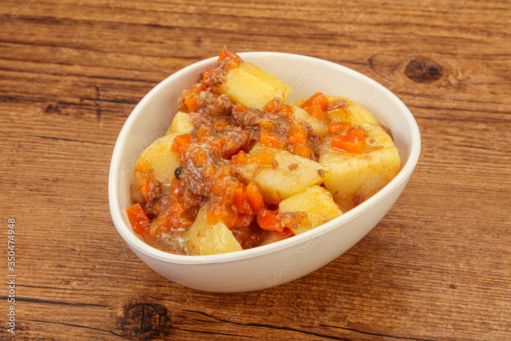 Roasted potato and beef with sauce Roasted potato and beef with sauce
