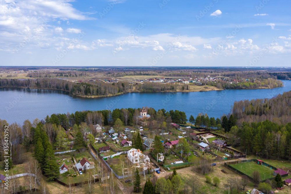 View from the drone of the village of Yegoriy on the banks of the Uvodsky Reservoir, Ivanovo Region, Russia.