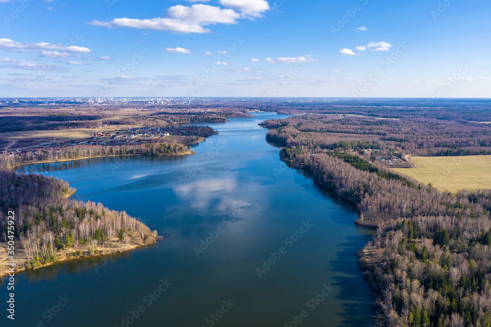 View from the drone of the Uvodsky reservoir on a spring day, Russia.