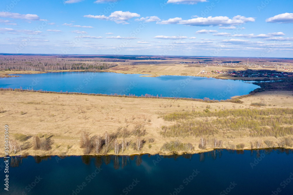 View from the drone of the Uvodsky reservoir on a spring day, Ivanovo Region, Russia. 