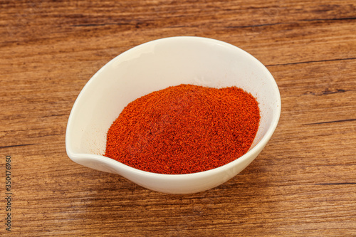 Dry paprika powder in the bowl