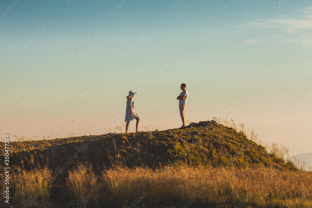 Woman making first steps in the relationship, walking up the hill