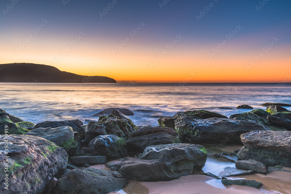 Rocky Sunrise Seascape at the Beach
