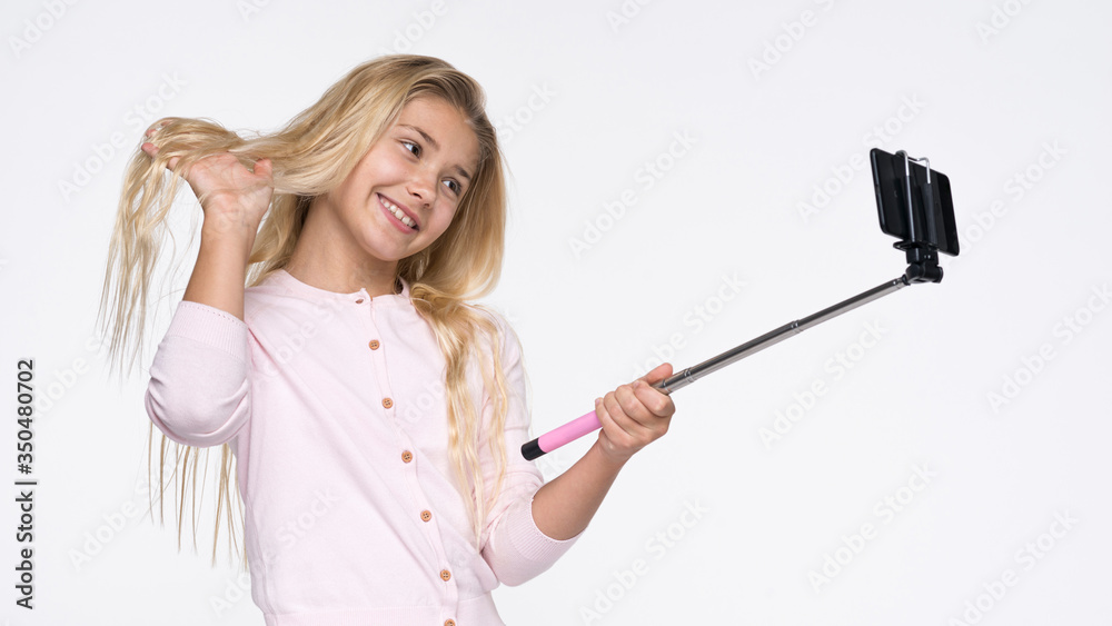 Beautiful girl taking selfies of herself Beautiful girl taking selfies of herself