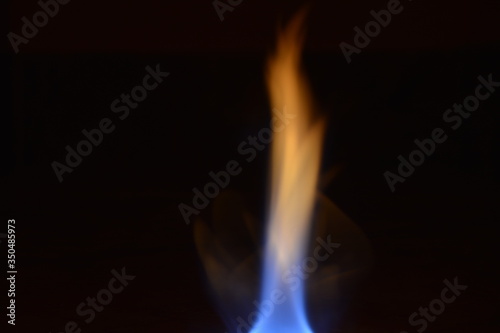 blue flame on black background
