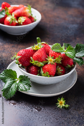 Fresh strawberry with a green leaves