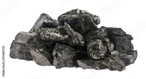 Pile of coal isolated on a white background close-up.