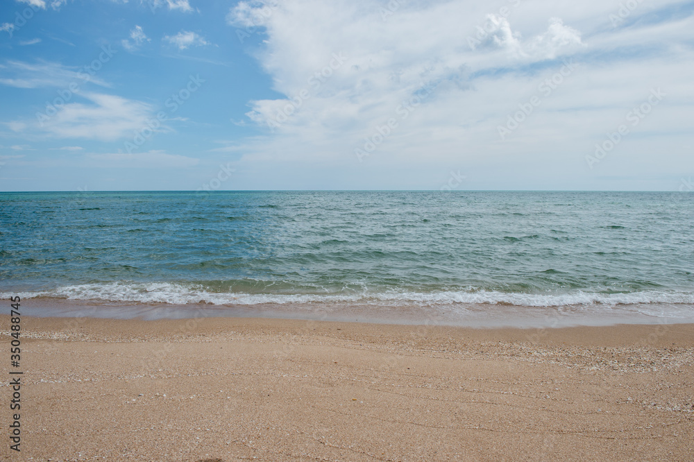 Background of the beach with sea wave and clouds sky Background of the beach with sea wave and clouds sky