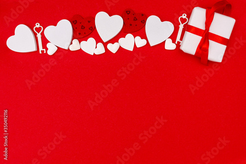 Top view frame with gift and red background