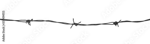 Metal barbed wire isolated on white background close-up.