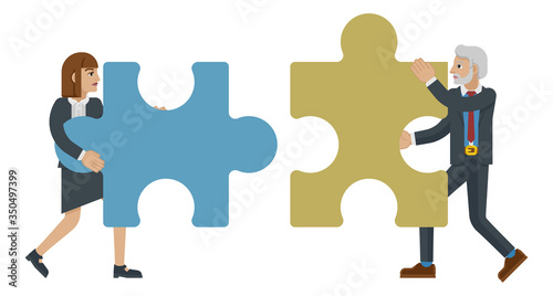 A puzzle piece jigsaw character concept of two business people working together in partnership or as a team © Christos Georghiou