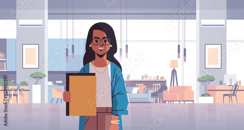 indian businesswoman holding folder business woman in coworking space modern office room interior creative workspace horizontal flat portrait vector illustration