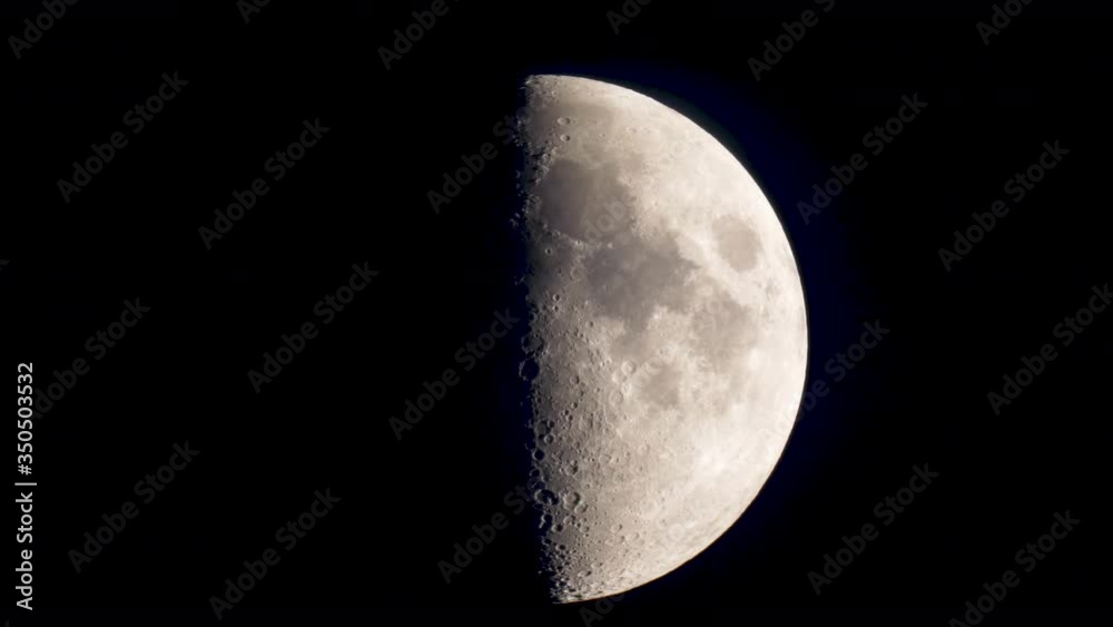 Moon Close up in detail time lapse half bright in night Moon Close up in detail time lapse half bright in night