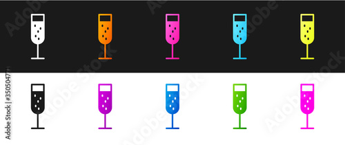 Set Glass of champagne icon isolated on black and white background. Vector