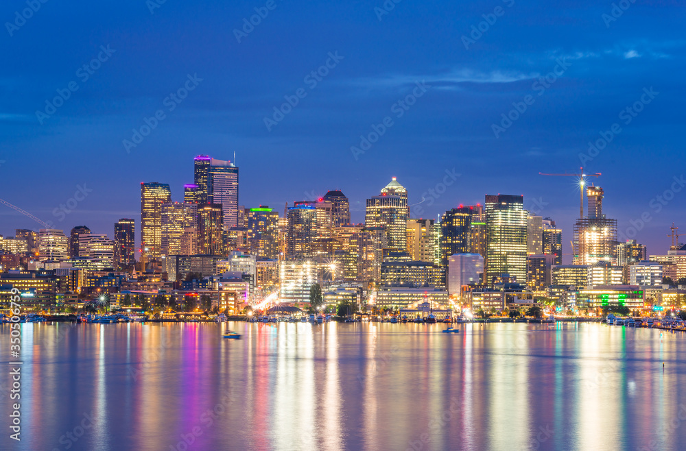 scenic view of Seattle cityscape in the night time with reflection of the water,Seattle,Washington,USA.