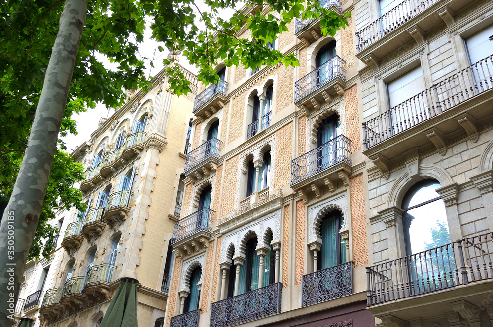 Traditional Facade with Balconies in a Modernist House in Barcelona, Spain

