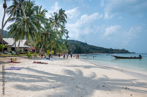 Fototapeta Naklejka Na Ścianę i Meble -   People swim and sunbathe on Haad yao beach, Koh Phangan.